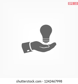 hand and bulb. icon. Vector Eps 10