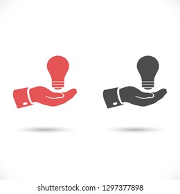 hand and bulb. icon. Vector Eps 10