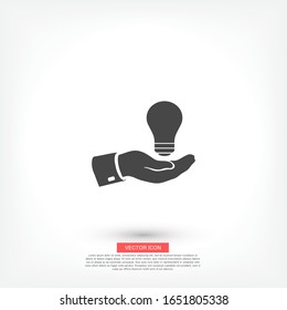 hand and bulb. icon. Vector Eps 10. Lorem Ipsum Flat Design