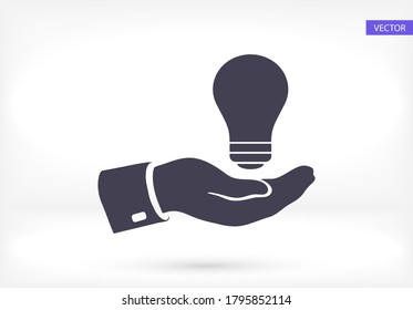 hand and bulb. icon. Vector Eps 10. Lorem Ipsum Flat Design 