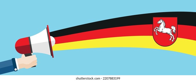 A hand with the bullhorn and german state Niedersachsen.  Eps 10 vector file.