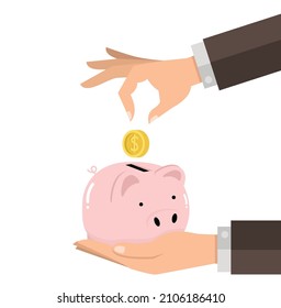 hand business saving coin in the piggy bank