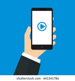 Hand of businessman hold mobile phone. Smartphone in hand. Flat design. Vector illustration