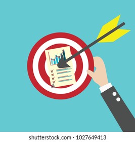 Hand of businessman hold target with arrow and graphic chart on the central