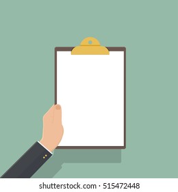 hand of businessman holding clipboard