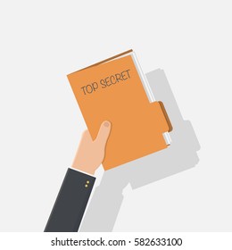 hand of businessman holding document top secret