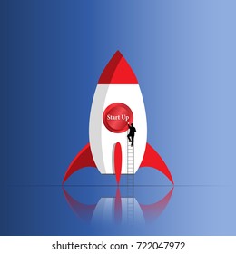 Hand Businessman pushing start button and launching space rocket. Startup, idea and technology concept. 
