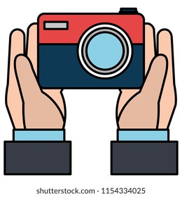 hand with camera photographic