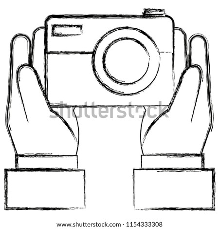 hand with camera photographic