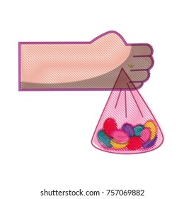 hand with candy almonds inside bag