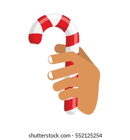 Hand and Candy Cane. Arm holding Christmas peppermint lollipop. Fingers and mint stick