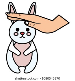 hand caressing cute rabbit character