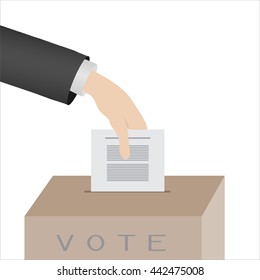 hand cast ballots on a white background in the vote box