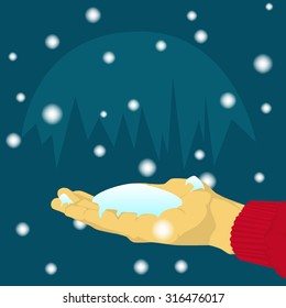 Hand catch falling snow at night