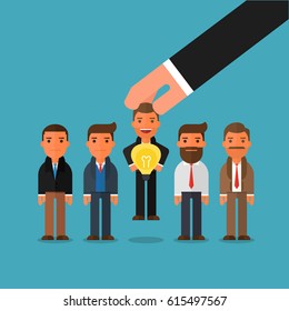 Hand choosing worker who has idea from group of businessmen. Recruitment concept.