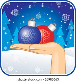 Hand with christmas-tree balls