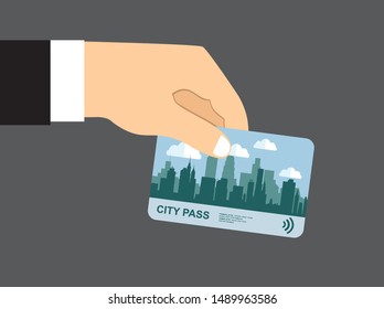 Hand with city pass. Bus, train, subway travel ticket with cashless payment system. Card with map of city with roards and houses. Vector illustration in flat style
