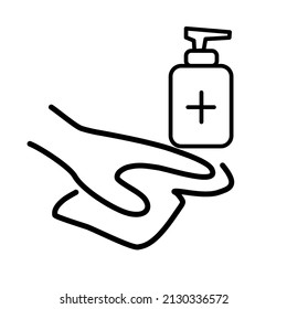 The hand of the cleaner is wiping the floor.  There is a bottle of alcohol gel on the side. ￼
