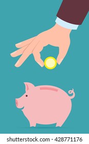Hand with coin and piggy bank. Hand holding coin. Concept of savings, earnings. Collect to pig bank.