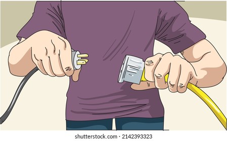 Hand connecting electrical plug. Man holding electric power plug. 