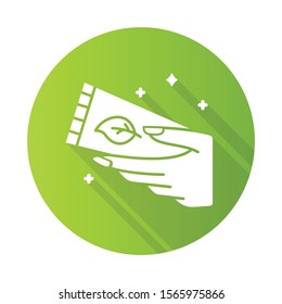 Hand cream tube green flat design long shadow glyph icon. Moisturizing, soothing lotion. Skincare product. Handcare. Paraben free. Dry skin solution. Organic cosmetics. Vector silhouette illustration