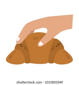 Hand with croissant