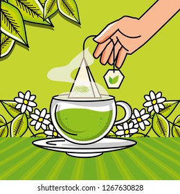 hand with cup and tea hot chamomile