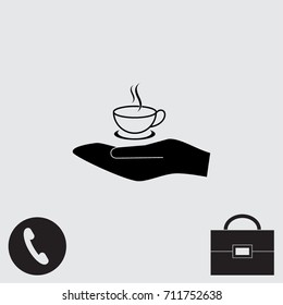 Hand and cup of tea vector icon