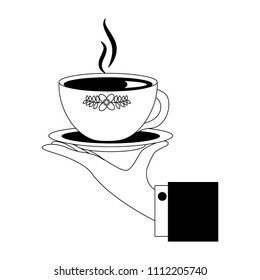 hand with delicious tea cup with dish