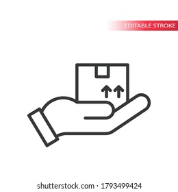 Mano con icono de vector de línea delgada de caja de entrega. Parcela de entrega con este símbolo de contorno de flechas laterales, trazo editable.