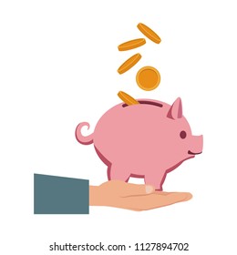 Hand depositing coin into piggy
