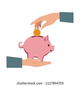 Hand depositing coin into piggy