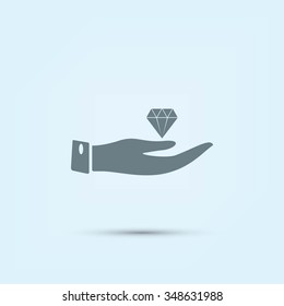 Hand and diamond icon