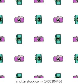 Hand Draw Camera Seamless Pattern. Vector colorful Endless White background in Doodle style. Texture For printing on fabric, wrapping paper, textiles, Wallpaper and other things.