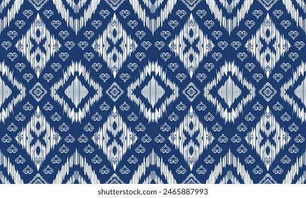 Hand draw Ethnic geometric fabric pattern .Ikat embroidery Ethnic oriental Pixel pattern.blue background.great for textiles, banners, wallpapers, wrapping.