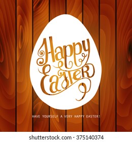 Hand draw inscription happy Easter on the wooden background. Inscribed in the contour of the egg. Vector illustration. Ideal for graphic design and greeting cards.