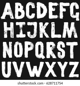 Hand drawing brush calligraphy texture of alphabet letters. Isolated vector set white on black