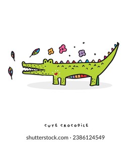 Hand drawing doodle cute crocodile vector illustration for t-shirt design for kids. Vector illustration design for fashion fabrics, textile graphics, prints, Cute alligator