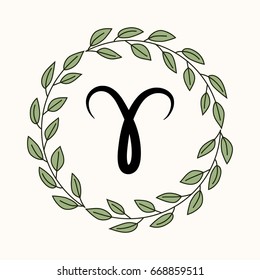Hand drawing flat aries symbol in rustic floral wreath