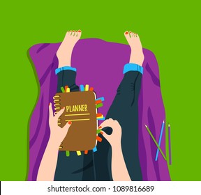 a hand drawing of a girl sitting on the ground outdoor and  holding a planner; top view; flat cartoon style; vector illustration