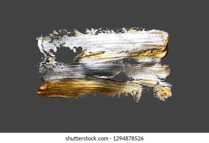 hand drawing gold brush stroke paint spot on a gray background, handmade vector illustration