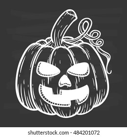 hand drawing halloween pumpkin with smile face on chalkboard background