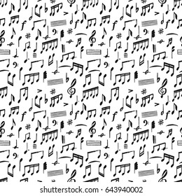 Hand drawing music notes in grunge brush graphic style. Big seamless vector background 
