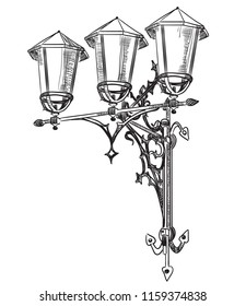 Hand drawing old street lamp vector monochrome illustration in black color isolated on white background