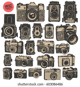 Hand drawing retro photo cameras. Big graphic isolated objects of vector graphic set.