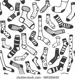 Hand drawing seamless pattern of doodle wool socks for background print.