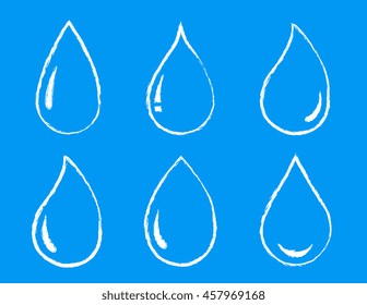 hand drawing set of glossy water drops on blue background