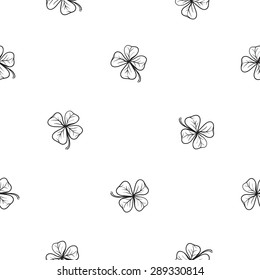 Hand drawing symbols of luck seamless pattern. Vector background with clover on white background. Chess grid order