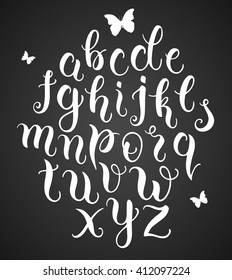 Hand drawn abc letters on blackboard background. Modern calligraphy alphabet. Vector illustration
