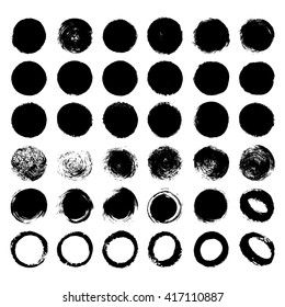 Hand drawn abstract black paint brush circle labels and shapes on white background. Vector painted stains set collection. 
